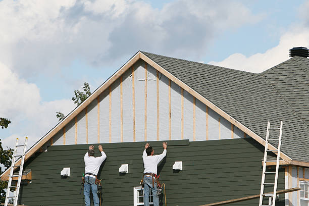 Professional Siding technician working in Russia, OH